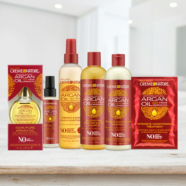 Immagine lifestyle della collezione Creme of Nature Argan Oil con alcuni prodotti esposti