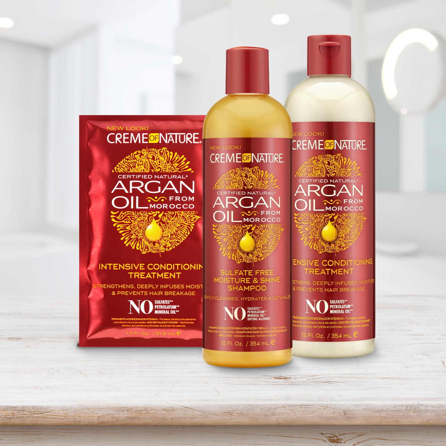 Immagine lifestyle shampoo e balsamo Creme of Nature Argan Oil con confezione monouso